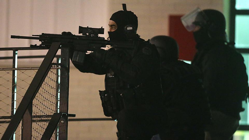 Paris Gun Attack Suspect Surrenders, Reports