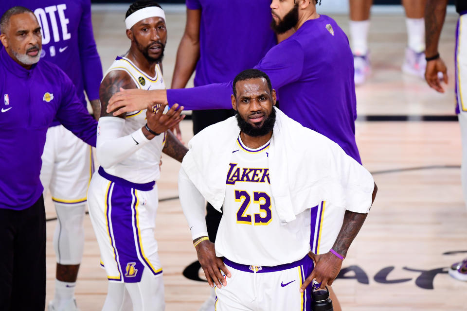 LAKE BUENA VISTA, FLORIDA - OCTOBER 11: LeBron James #23 of the Los Angeles Lakers reacts during the fourth quarter against the Miami Heat in Game Six of the 2020 NBA Finals at AdventHealth Arena at the ESPN Wide World Of Sports Complex on October 11, 2020 in Lake Buena Vista, Florida. NOTE TO USER: User expressly acknowledges and agrees that, by downloading and or using this photograph, User is consenting to the terms and conditions of the Getty Images License Agreement.  (Photo by Douglas P. DeFelice/Getty Images)