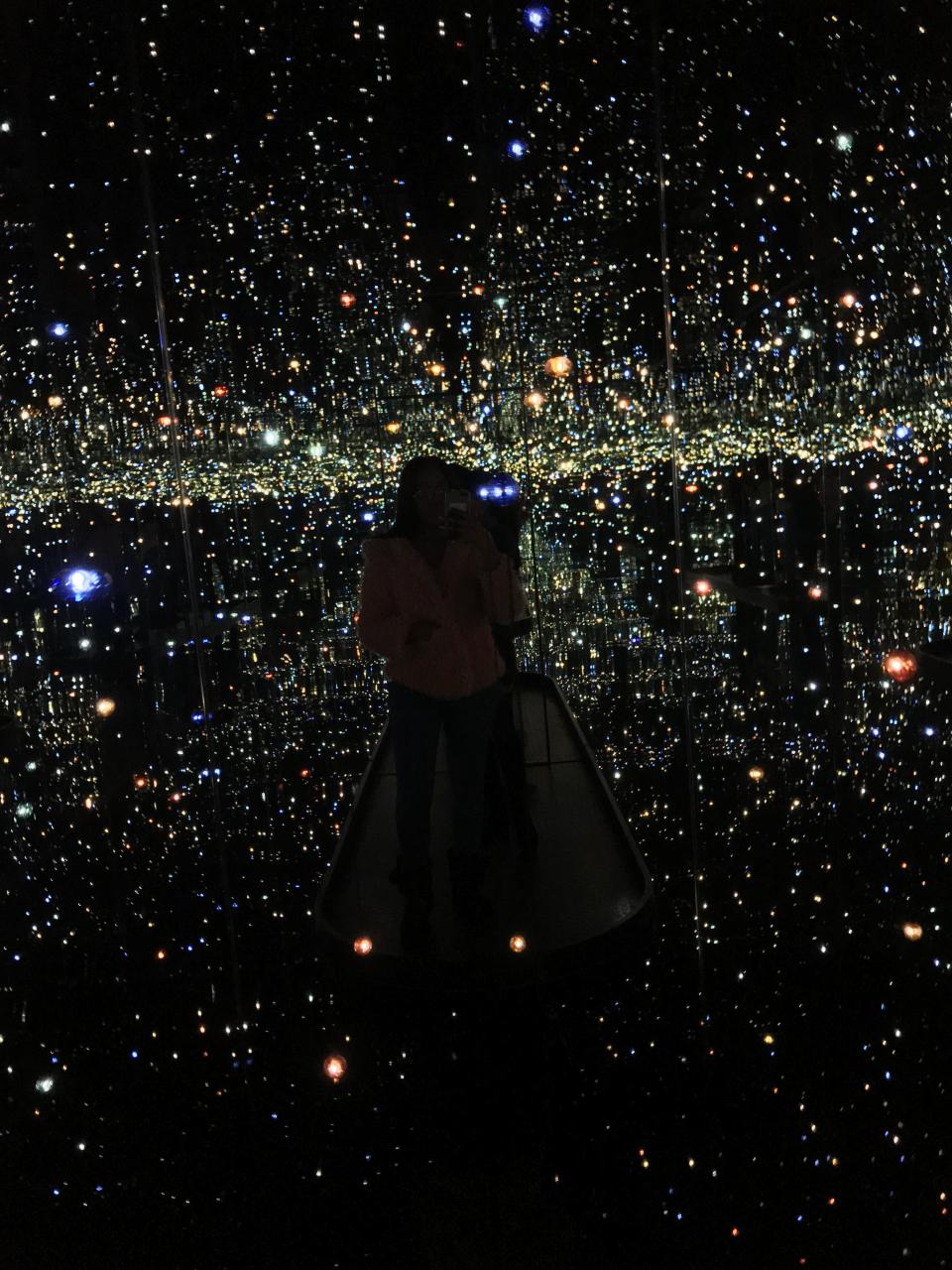 Yayoi Kusama's "Infinity Mirror Rooms" exhibition at the High Museum of Art in Atlanta. The Japanese contemporary artist works primarily in sculpture and installation and is considered one of the 20th century’s most influential artists.