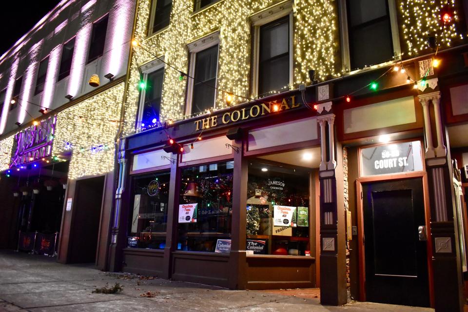 The Colonial bar and restaurant on Court Street in Binghamton stands empty Thursday, Dec. 9, after an impromptu closure amid allegations of sexual assault by employees. Also closed until further notice are Dos Rios Cantina, at left, and the Stone Fox on Hawley Street.