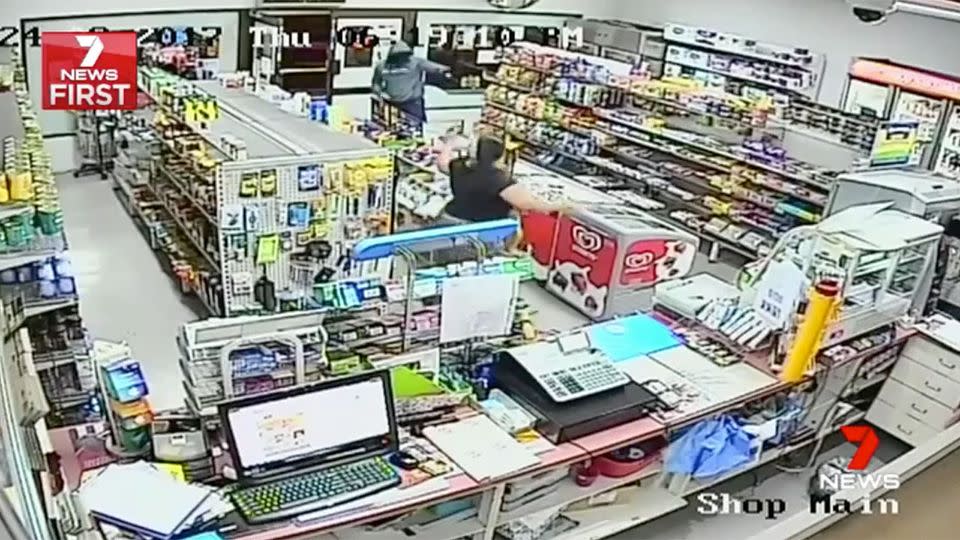 The moment the man bursts through the doors of the store, leaving the mother shocked. Source: 7 News