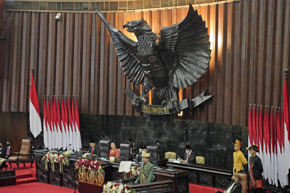 Indonesian President Joko Widodo delivers his annual State of the Nation Address ahead of the country's Independence Day, at the parliament building in Jakarta, Indonesia, Tuesday, Aug. 16, 2022. (AP Photo/Tatan Syuflana, Pool)