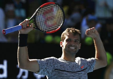 Tennis - Australian Open - Melbourne Park, Melbourne, Australia - 25/1/17 Bulgaria's Grigor Dimitrov celebrates after winning his Men's singles quarter-final match against Belgium's David Goffin. REUTERS/Thomas Peter