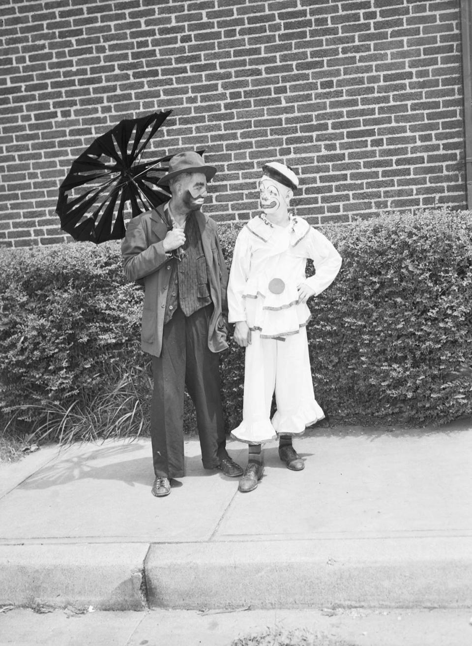 Aug. 14, 1945: Two of the clowns who will perform at the Community Circus of the Recreation Department are, left to right, Joe Cameron and Don Quinn. They will be featured in an act with 30 other clowns tumbling out of an automobile.