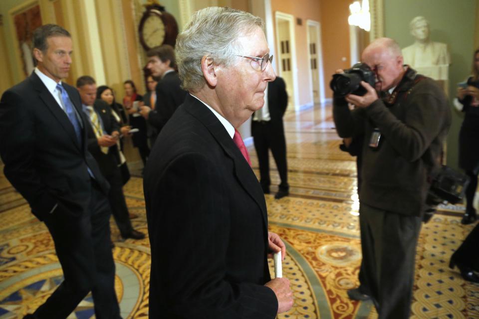 McConnell arrives to speak to reporters after the weekly Republican caucus lunch meeting at the U.S. Capitol in Washington