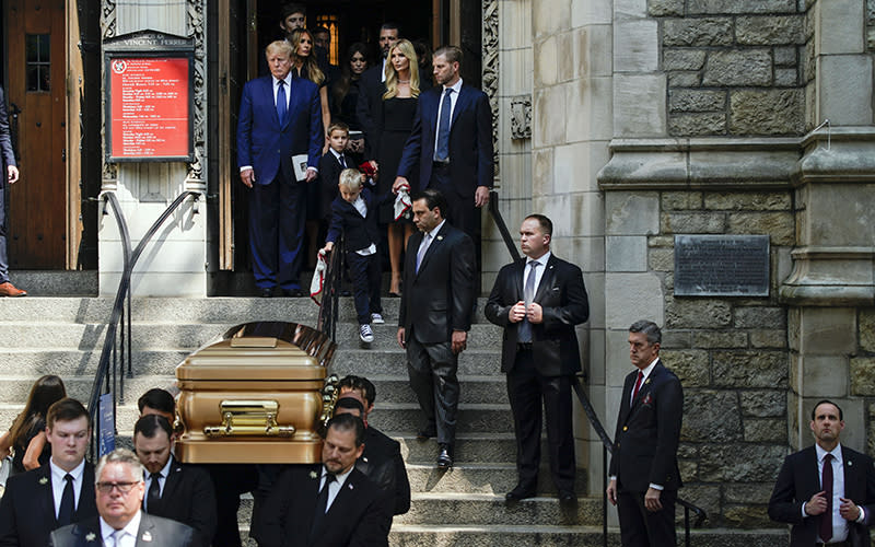 Former President Trump leads his family behind the casket of Ivana Trump