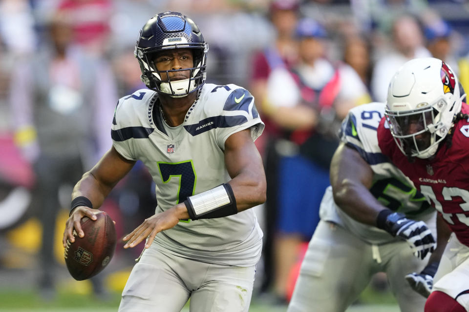 Seattle Seahawks quarterback Geno Smith (7) passes against the Arizona Cardinals during the first half of an NFL football game in Glendale, Ariz., Sunday, Nov. 6, 2022. (AP Photo/Matt York)