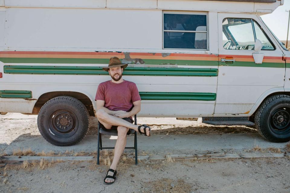 Aidan Paringer outside his van.