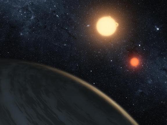 An artist's image of Kepler-16b, the first known planet to orbit both stars in a binary system.