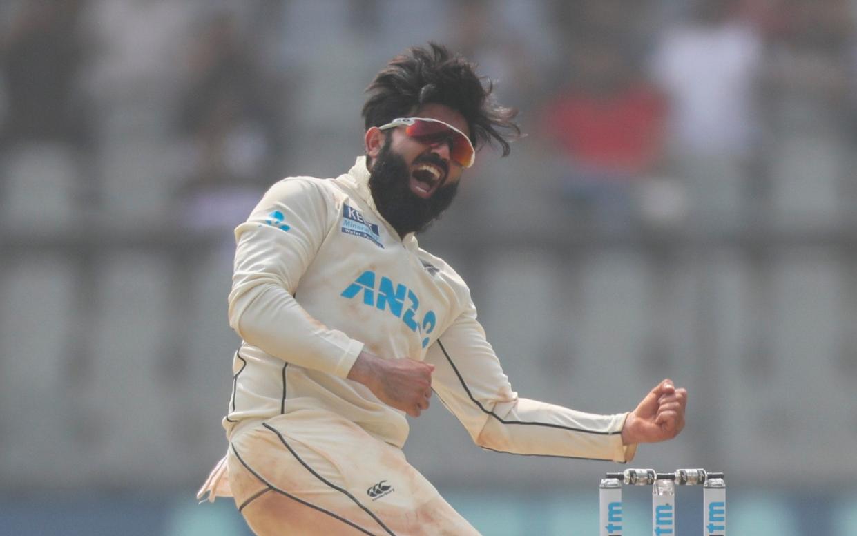 New Zealand's Ajaz Patel celebrates the dismissal of India's Mohammed Siraj during the day two of their second test cricket match with India in Mumbai, India, Saturday, Dec. 4, 2021 - New Zealand's Ajaz Patel just third man to take 10-wicket haul in Tests but India remain in command - AP