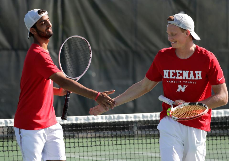 Neenah's Khaled Saleh, left, and doubles partner Nolan Kubiak compete during the Fox Valley Association boys tennis meet May 19 at Appleton East High School. They are the No. 2 seed in Division 1 doubles for the state meet.