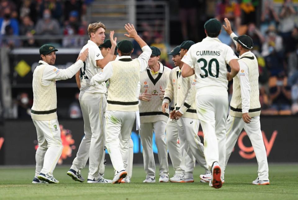Cameron Green celebrates the wicket of Rory Burns (Darren England via AAP/PA) (PA Media)
