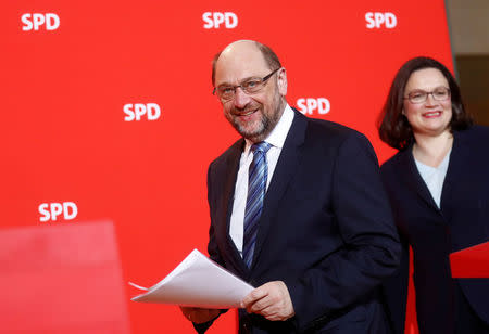 Social Democratic Party (SPD) leader Martin Schulz and incoming party leader Andrea Nahles arrive to a news conference at the party headquarters in Berlin, Germany, February 7, 2018. REUTERS/Hannibal Hanschke