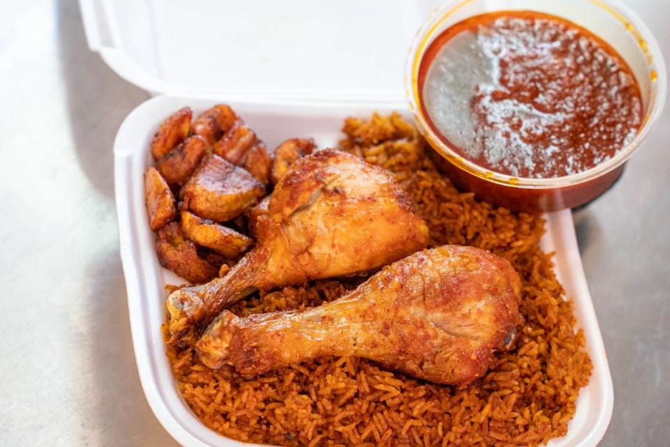 Jollof Rice dish with drumsticks and plantains at Mama Gee’s.