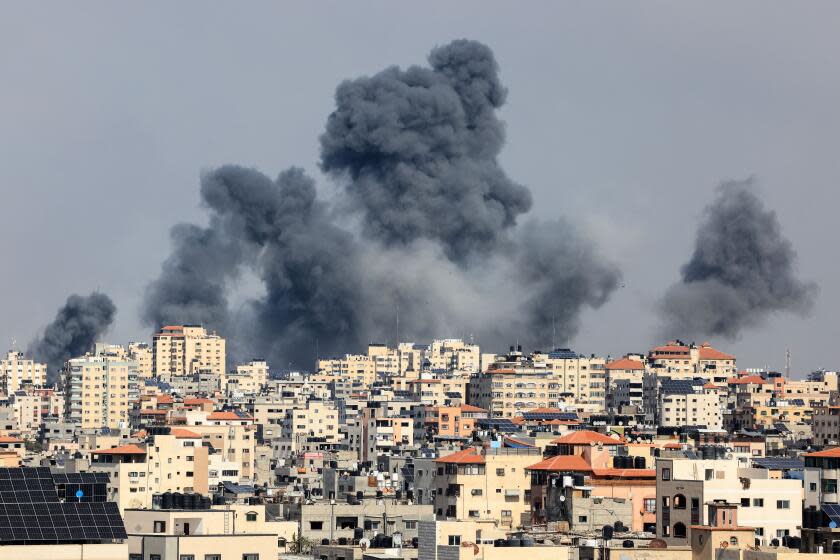 EDITORS NOTE: Graphic content / Smoke rises over Gaza City on October 7, 2023 during Israeli air strikes. Palestinian militants have begun a "war" against Israel, the country's defence minister said on October 7 after a barrage of rockets were fired and fighters from the Palestinian enclave infiltrated Israel, a major escalation in the Israeli-Palestinian conflict. (Photo by MAHMUD HAMS / AFP) (Photo by MAHMUD HAMS/AFP via Getty Images)