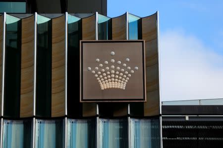 FILE PHOTO: The logo of Australian casino giant Crown Resorts Ltd adorns the hotel and casino complex in Melbourne, Australia, June 13, 2017. REUTERS/Jason Reed/File Photo