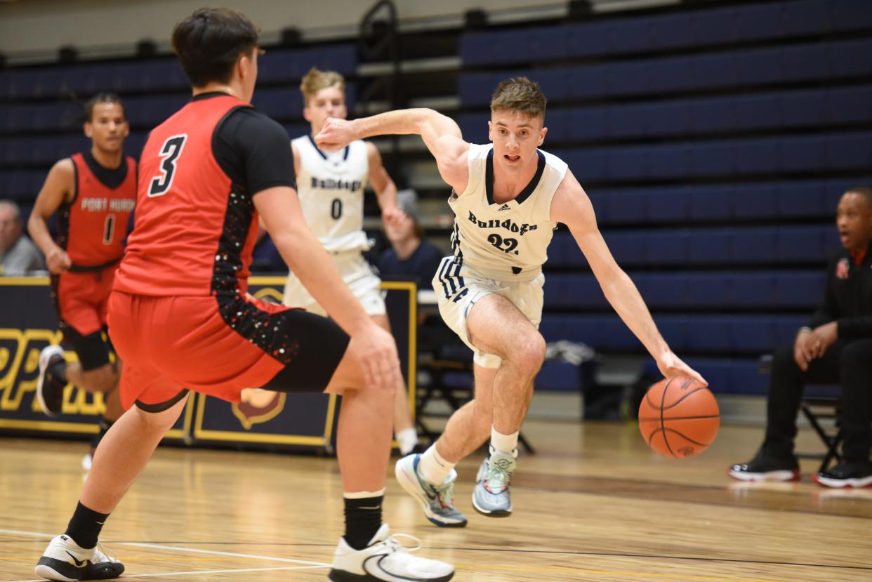 Yale's Connor Jakubiak drives the lane during a boys basketball game earlier this season.