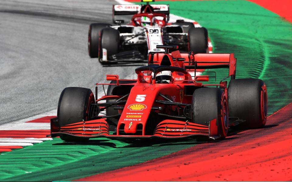 Sebastian Vettel of Germany driving the (5) Scuderia Ferrari SF1000 leads Antonio Giovinazzi of Italy driving the (99) Alfa Romeo Racing C39 Ferrari during the Formula One Grand Prix of Austria at Red Bull Ring on July 05, 2020 in Spielberg, Austria - Getty Images Europe