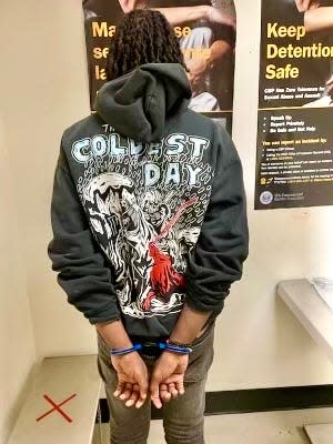 State police said Denzel Gomes, 18, was apprehended without incident by local, state, and federal authorities, and handcuffed with a set of blue New Bedford Police handcuffs.