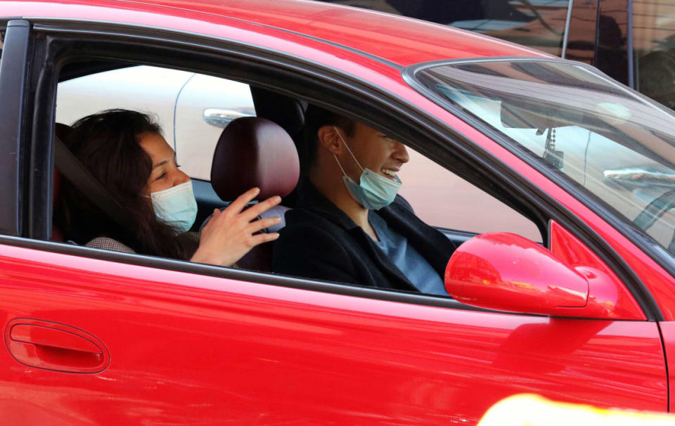 <div class="inline-image__caption"><p>Katie Holmes and Emilio Vitolo Jr. in a red Pontiac on Sept. 21, 2020.</p></div> <div class="inline-image__credit">LRNYC/MEGA/Getty</div>