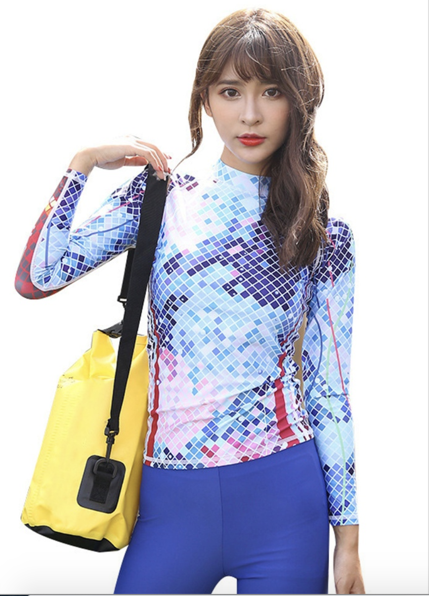 One-piece long sleeve rash guard top, S$56 (was S$60). PHOTO: Zalora