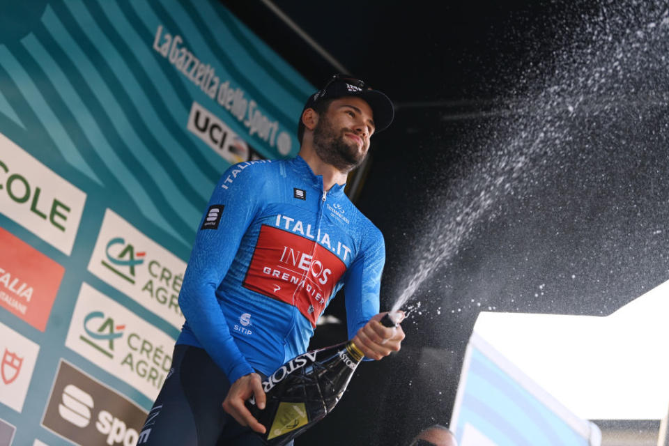 FOLLONICA ITALY  MARCH 07 Filippo Ganna of Italy and Team INEOS Grenadiers celebrates at podium as Blue Leader Jersey winner during the 58th TirrenoAdriatico 2023 Stage 2 a 210km stage from Camaiore to Follonica  TirrenoAdriatico  on March 07 2023 in Follonica Italy Photo by Tim de WaeleGetty Images