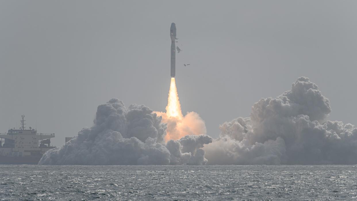  A rocket launches from sea. 