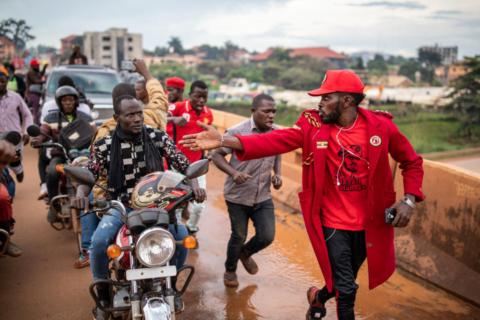 Supporters of Bobi Wine escort him through the streets on October 31, 2019 in Kampala, Uganda. Bobi Wine, whose real name is Robert Kyagulanyi Ssentamu, is a popstar and opposition leader under the ‘People Power’ campaign.