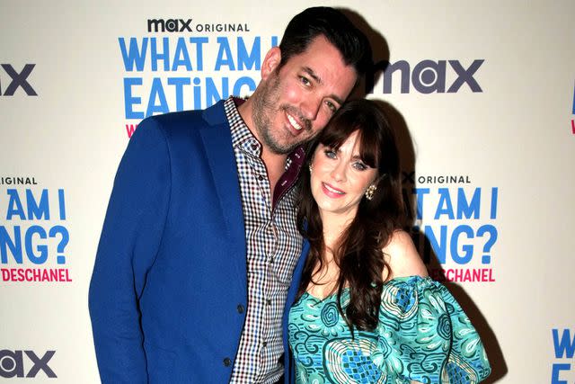 <p>Jeff Kravitz/FilmMagic for Warner Bros. Discovery</p> Jonathan Scott (left) and Zooey Deschanel photographed in Los Angeles on May 22, 2023