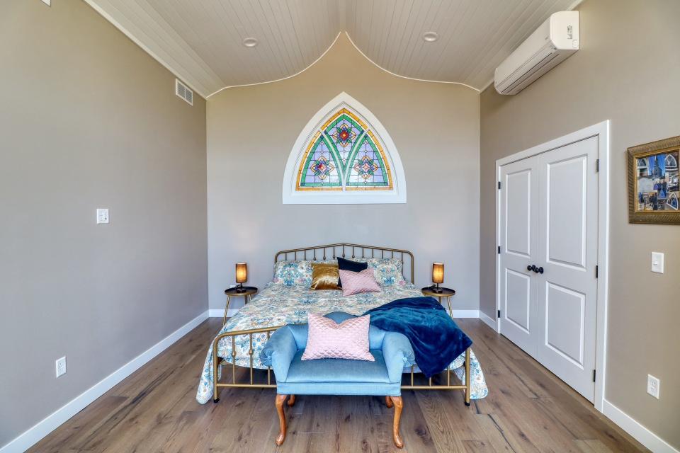 The primary suite in a chapel conversion house in Minnesota.