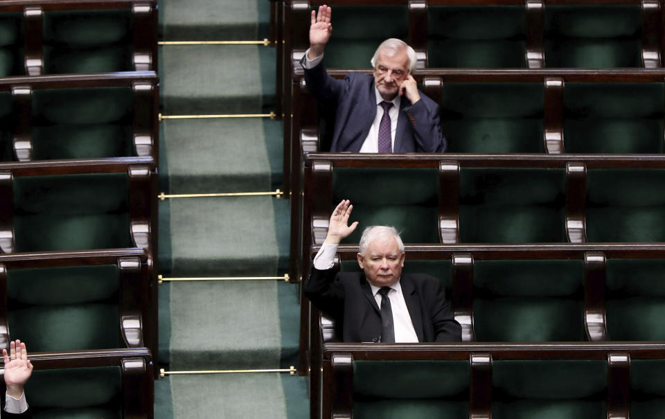 Jaroslaw Kaczynski, leader of Poland's ruling conservative Law and Justice party, takes part in a parliamentary session in Warsaw, Poland, Monday, April 6, 2020. Uncertainty over whether Poland will hold a postal presidential election during the COVID-19 coronavirus pandemic deepened Monday after a deputy prime minister resigned, leaving Kaczynski's ruling party without enough votes to approve an exclusively mail-in ballot. (AP Photo/Czarek Sokolowski)