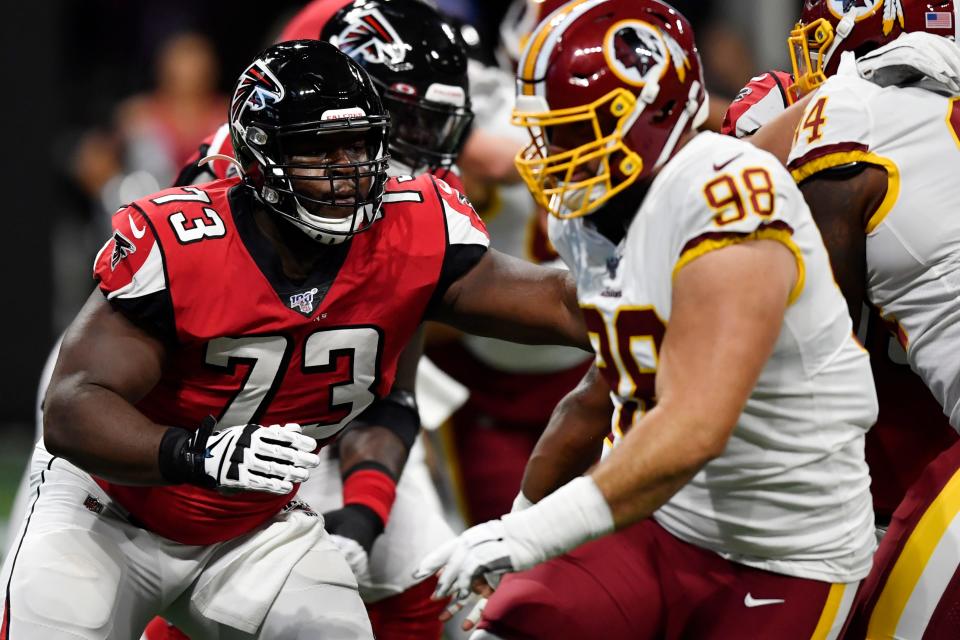 Atlanta Falcons offensive tackle Matt Gono (73) works against Washington Redskins defensive end Matthew Ioannidis (98) during the first half an NFL preseason football game.