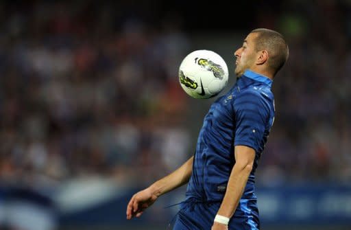 France's forward Karim Benzema controls the ball during the friendly football match France vs Iceland at the Hainaut Stadium in the French northern city of Valenciennes. France battled back from two goals down at half-time to beat Iceland 3-2 and avoid a humiliating defeat in the first of three warm-ups for Euro 2012 here on Sunday