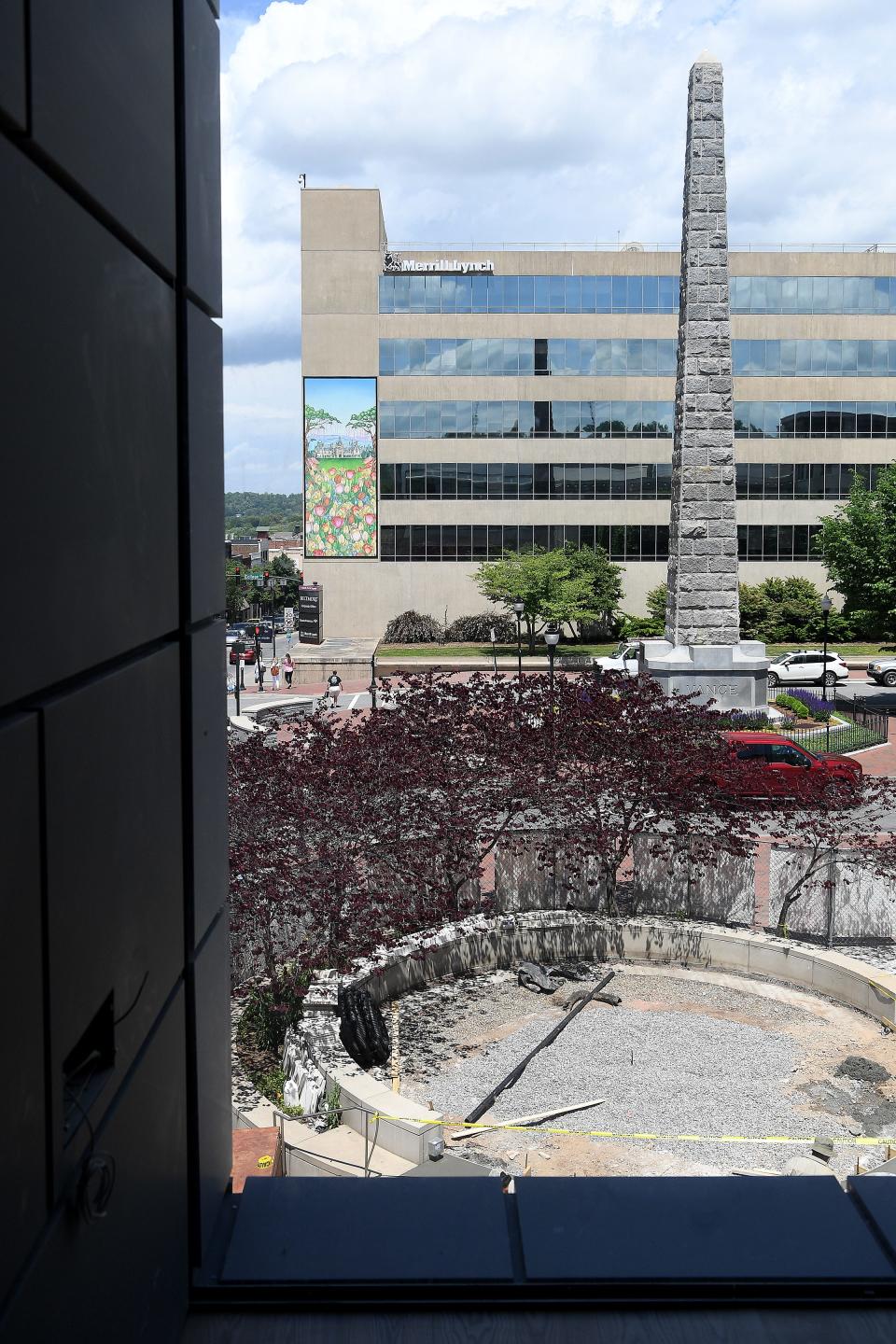 The oculus of the new Asheville Art Museum looks out onto the Vance Monument and Pack Square Park. 