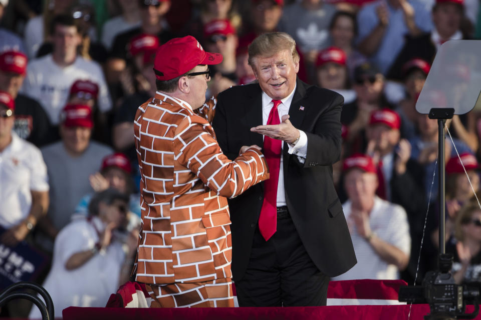 President Donald Trump, right, brings Blake Marnell on stage during a campaign rally in Montoursville, Pa., Monday, May 20, 2019. (AP Photo/Matt Rourke)