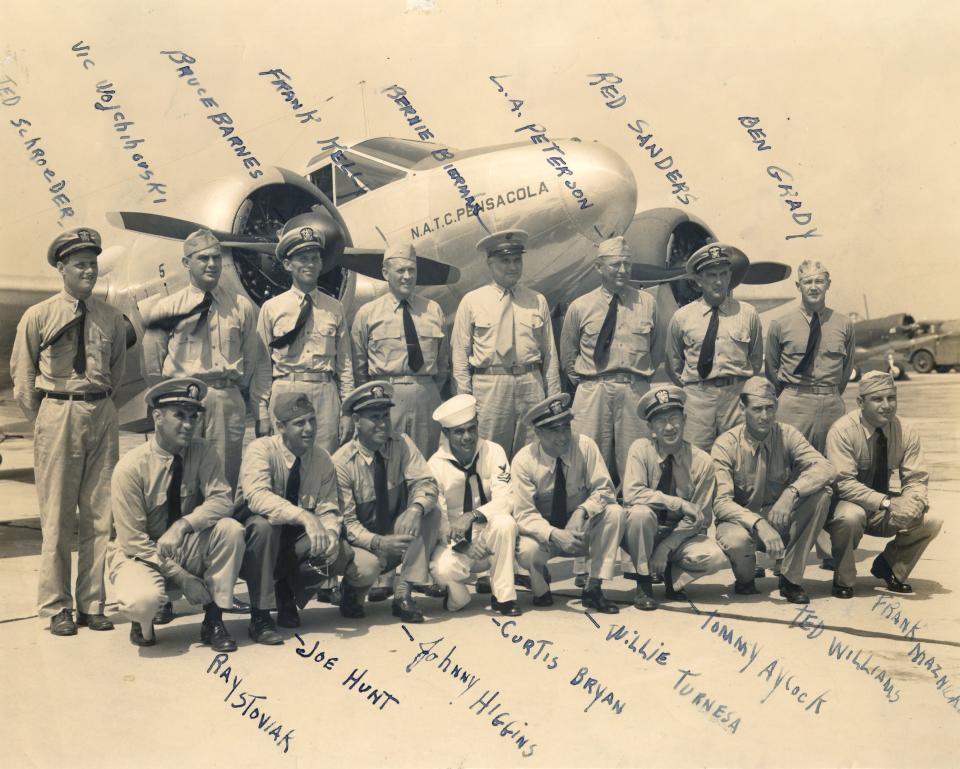 Ted Williams, kneeling, second from far right, during training at NAS Pensacola during World War II with other professional baseball players.