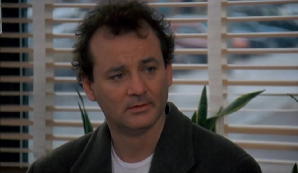 Phil Connors sitting in a diner in "Groundhog Day"