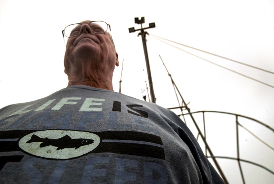 Gary Burke aboard his 50-foot fishing vessel, Tytan, docked at Santa Barbara Harbor.