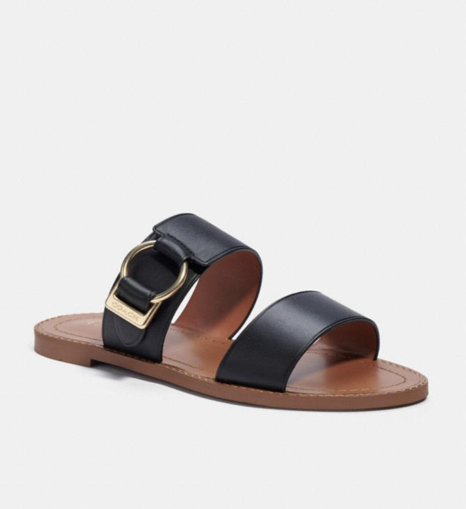 Hallie Sandal in Black (Photo via Coach Outlet)