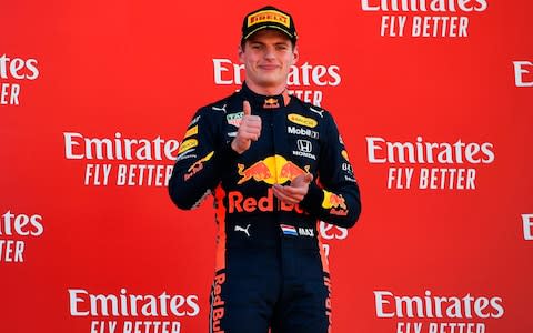 Red Bull Racing's Belgian driver Max Verstappen gives thumbs-up on the podium after finishing third in the Spanish Formula One Grand Prix at the Circuit de Catalunya in Montmelo in the outskirts of Barcelona on May 12, 2019 - Credit: AFP