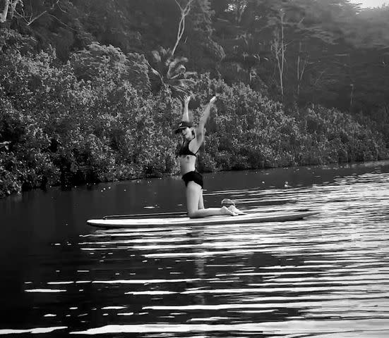 <p>Miley Cyrus/Instagram</p> Miley Cyrus raised her arms in the air when she finished her yoga posing on Oct. 29