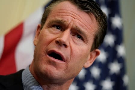 FILE PHOTO - Sen. Todd Young (R-IN) speaks at a news conference about the Tobacco to 21 Act, which would raise the minimum age to buy tobacco products and e-cigarettes to 21, on Capitol Hill