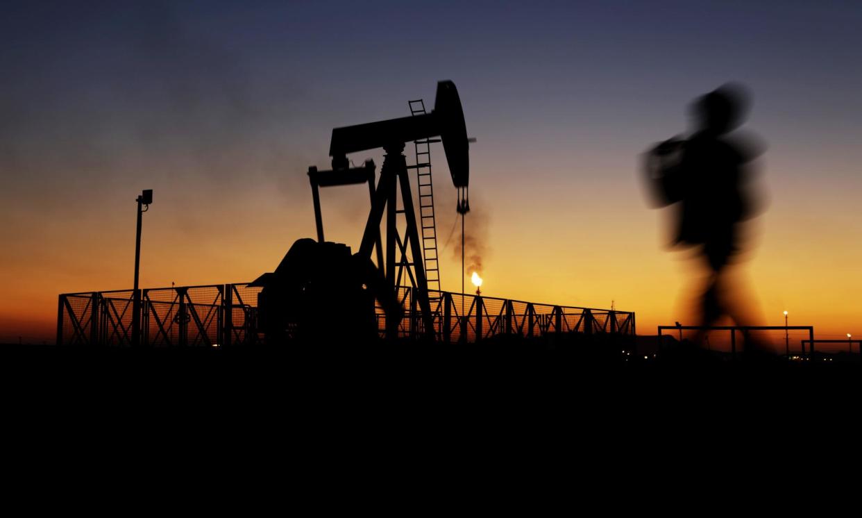 <span>Overall oil demand this year is expected to reach 103m barrels a day. The slow growth in demand has been attributed to China’s weakening economy.</span><span>Photograph: Hasan Jamali/AP</span>