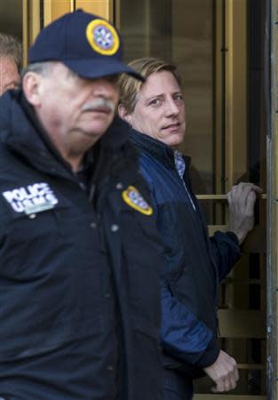 Dana Giacchetto (R) arrives at the Manhattan Federal Courthouse in New York February 20, 2014. REUTERS/Brendan McDermid