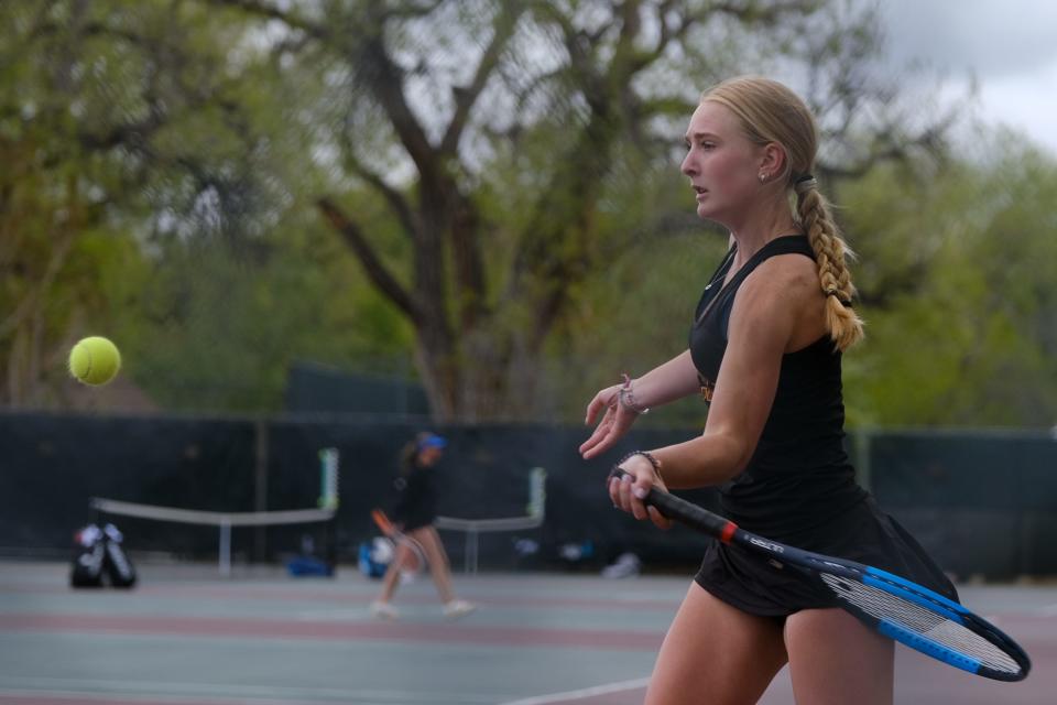Rocky Mountain’s Faith Galyardt hits a forehand in a first round match against a Legend player during day one of the Colorado 5A girls state tennis tournament at City Park in Denver, Colo., on Thursday, May 9, 2024.