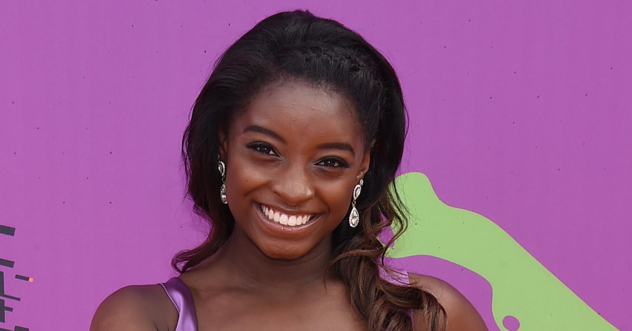 Simone Biles Adds a Sporty Twist to a Sleek Cutout Bodycon Mini Dress