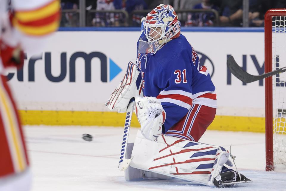 Feb 12, 2024; New York, New York, USA; New York Rangers goaltender Igor Shesterkin (31) makes a save against the Calgary Flames during the second period at Madison Square Garden.