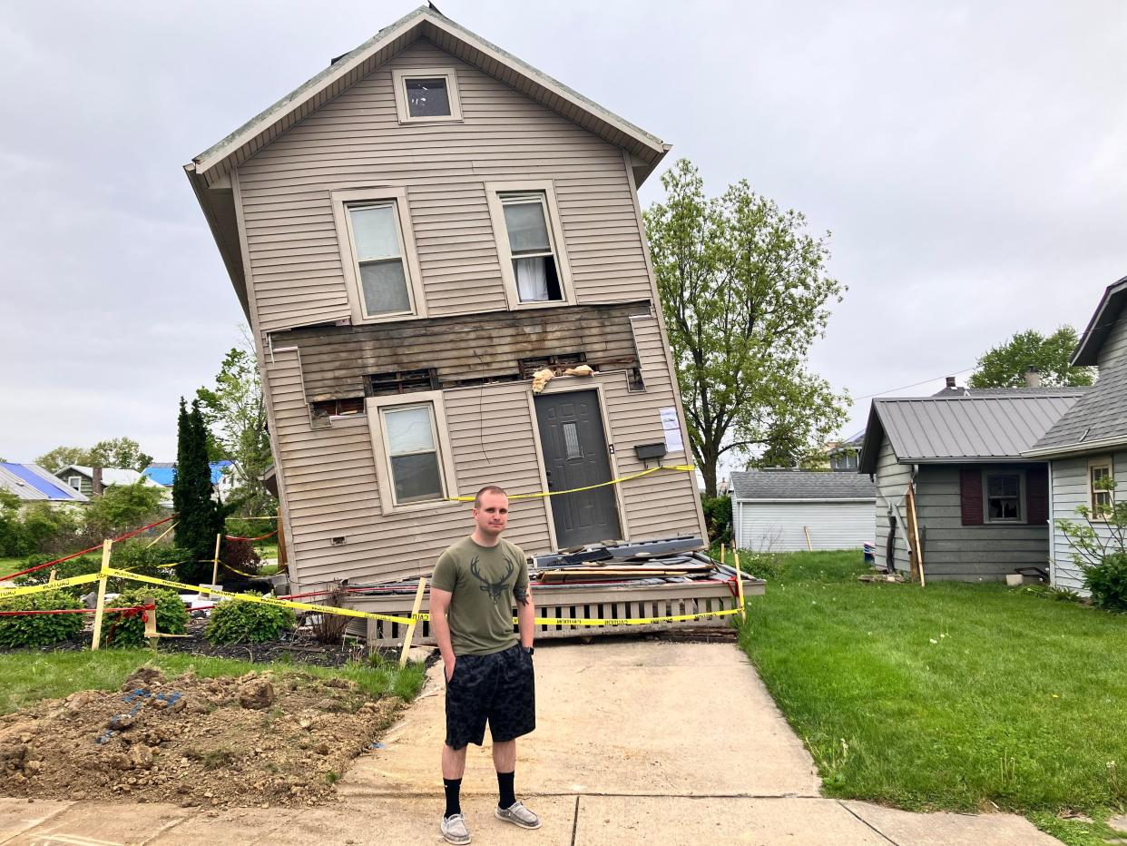 Eric Thomas's Kaler Avenue home in Bucyrus continues to tilt and move from one side to another three week after the tornado hit Bucyrus. The house will be demolished, he said.