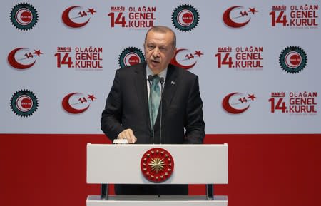 Turkish President Erdogan speaks during a meeting in Ankara