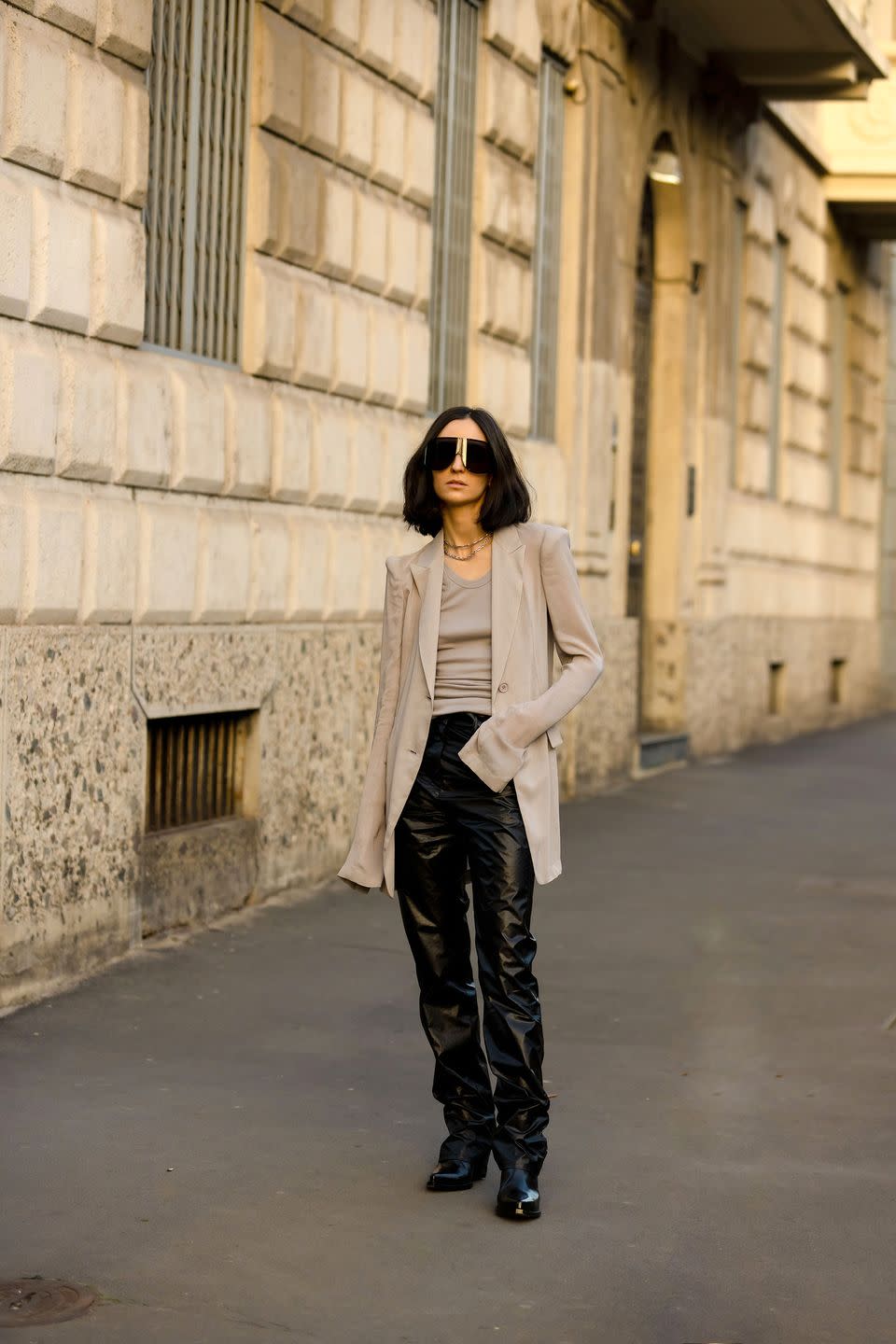 <p>Leather trousers and a slim jacket are minimal and chic.</p>